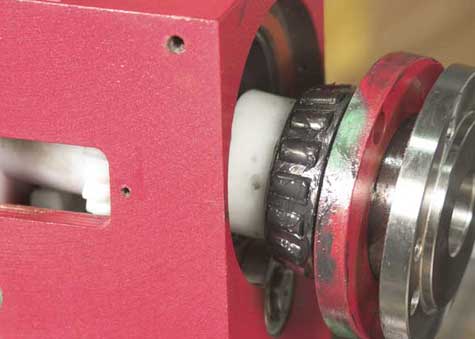 Grease front bearing and insert spindle